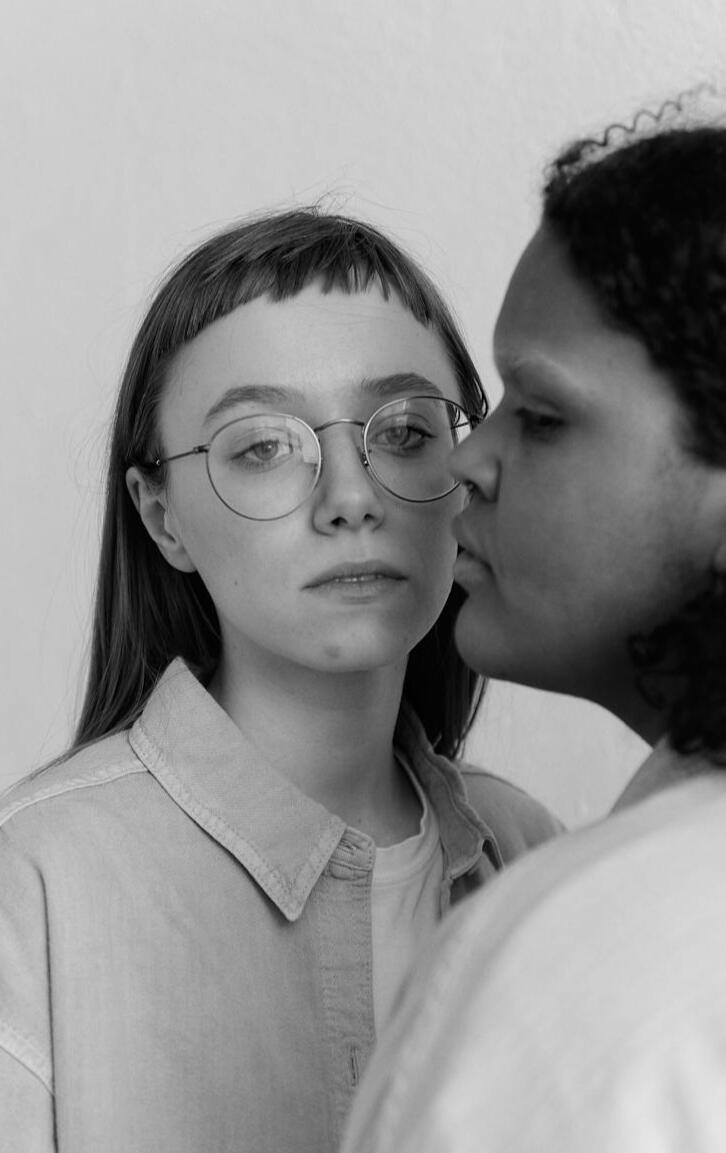 girl with braids smiling