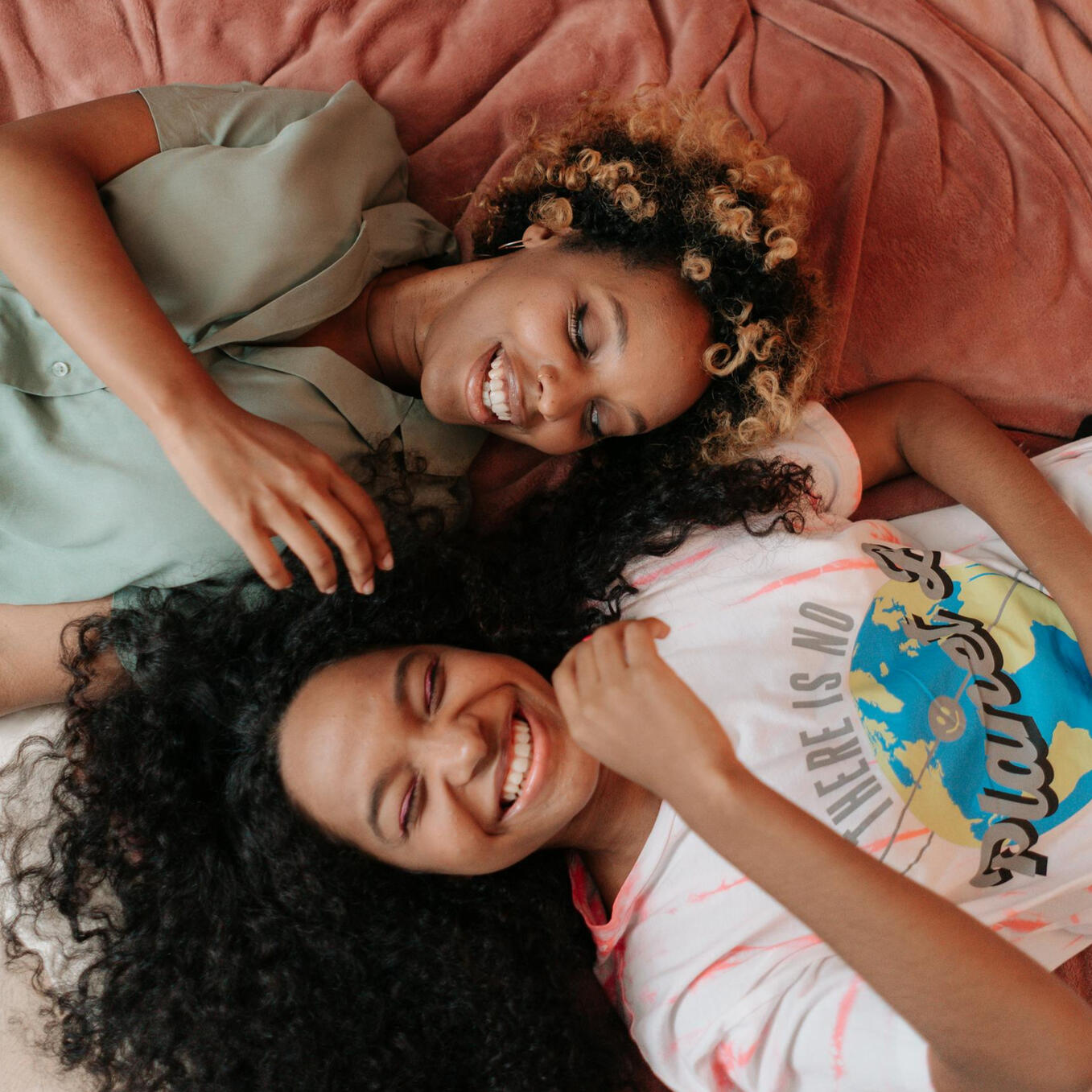 girl with braids smiling