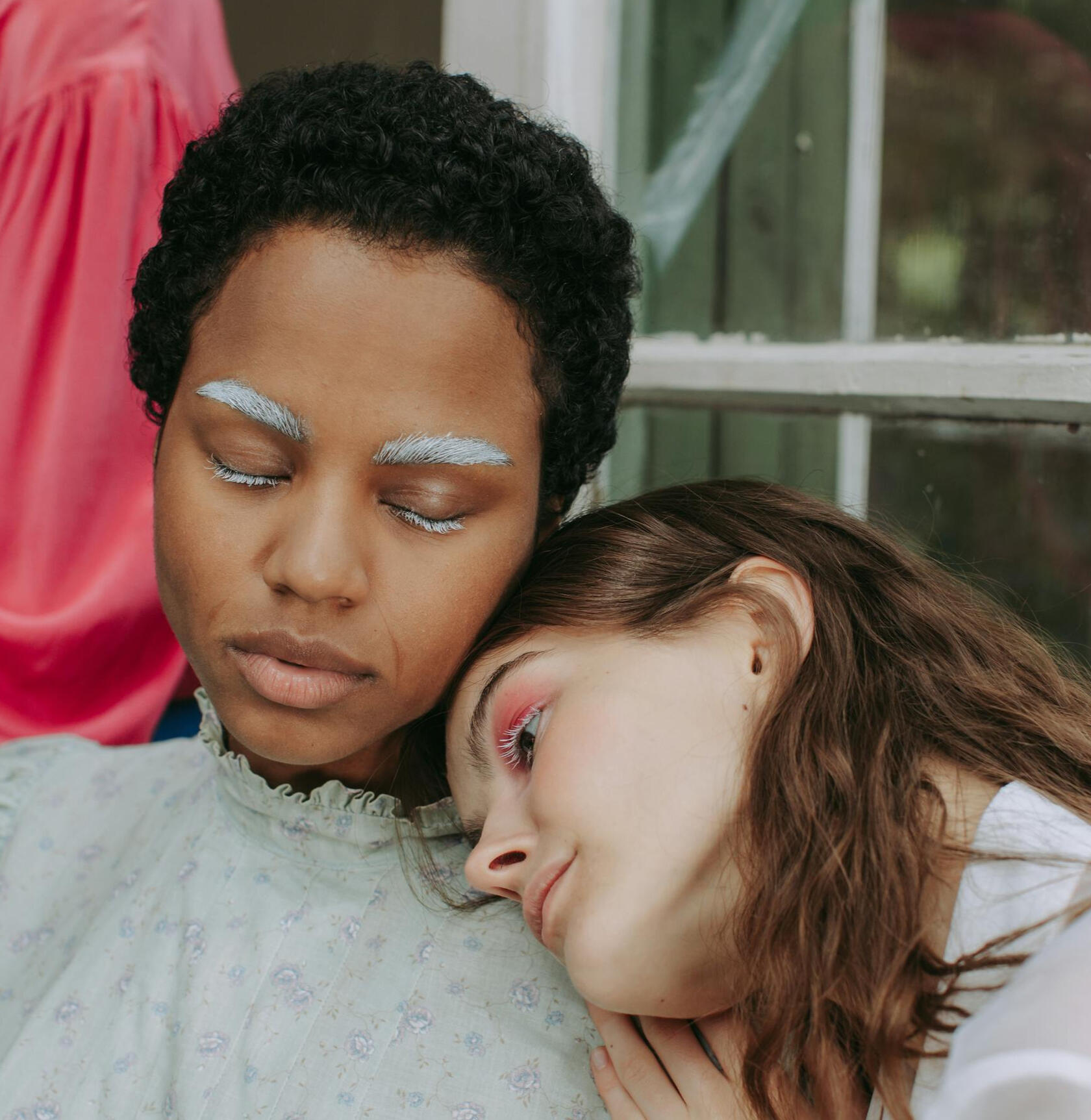 girl with braids smiling