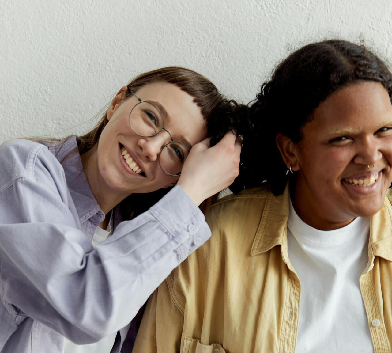 girl with braids smiling